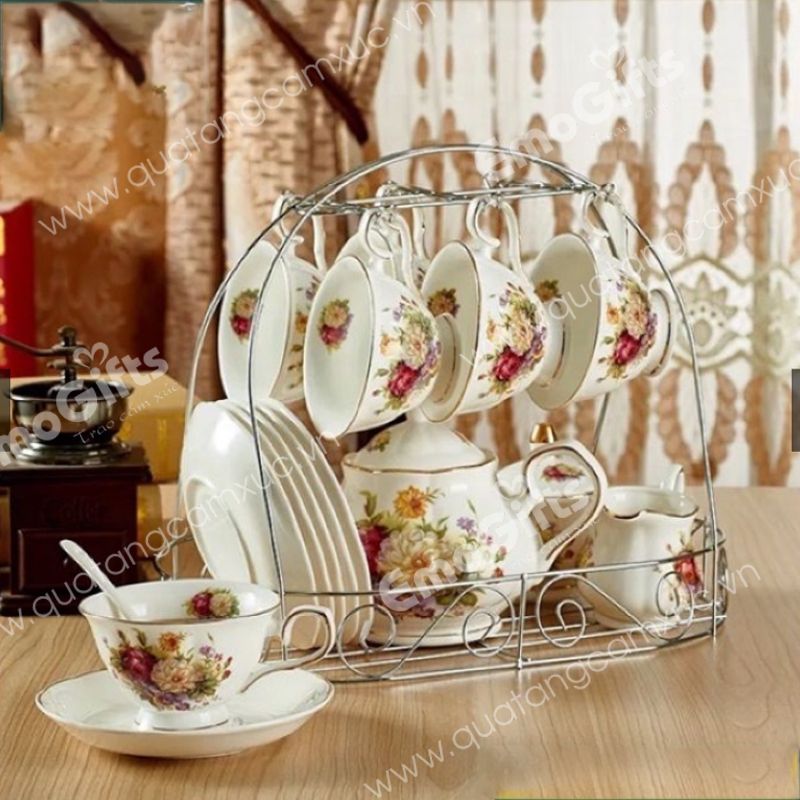 Bộ trà hoa văn có giá treo inox 